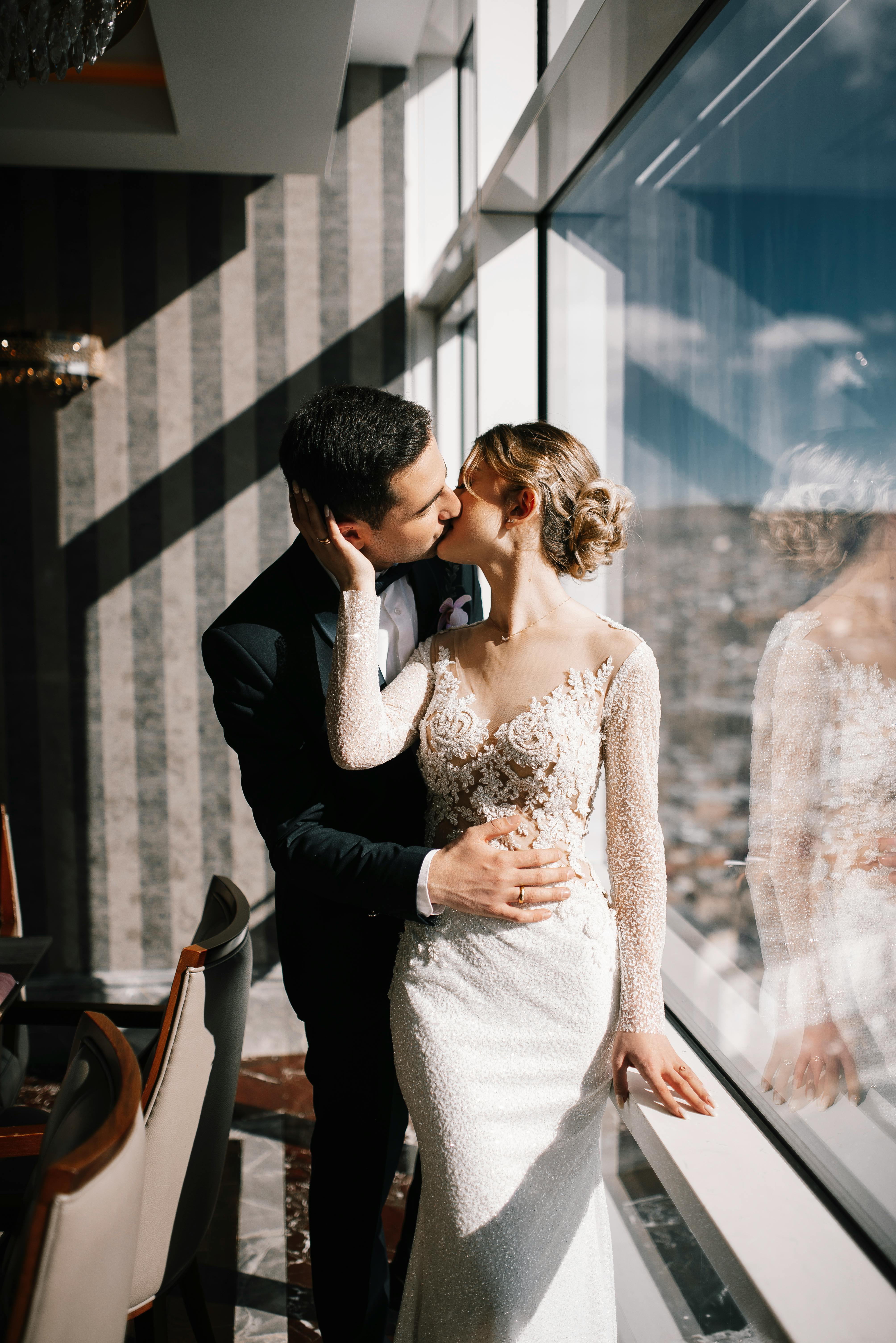 Groom Kissing Her Lovely Wife