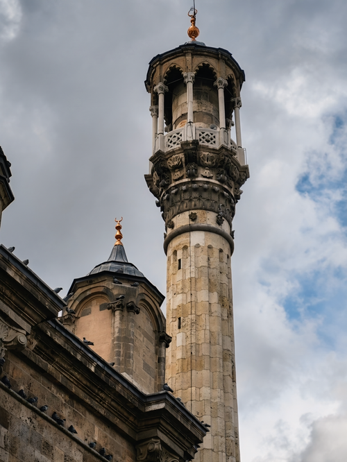 Free Ornate minaret and tower silhouette against a dramatic sky. Stock Photo