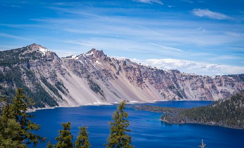 Free Beautiful view of Crater Lake with clear blue water and surrounding cliffs, Oregon. Stock Photo