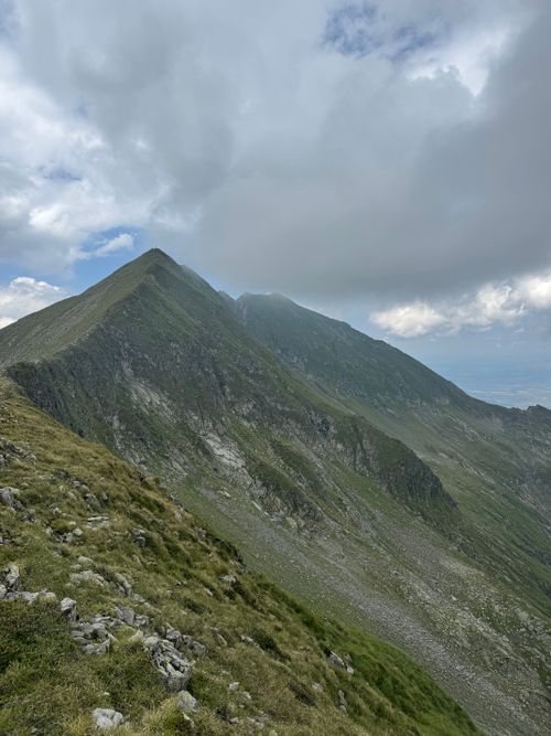 Free Breathtaking landscape of the Făgăraș Mountains, Romania, on a cloudy summer day. Stock Photo