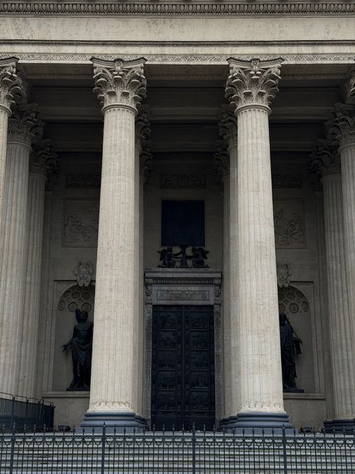 Free Close-up view of grand neoclassical columns at a historic site in Russia. Stock Photo