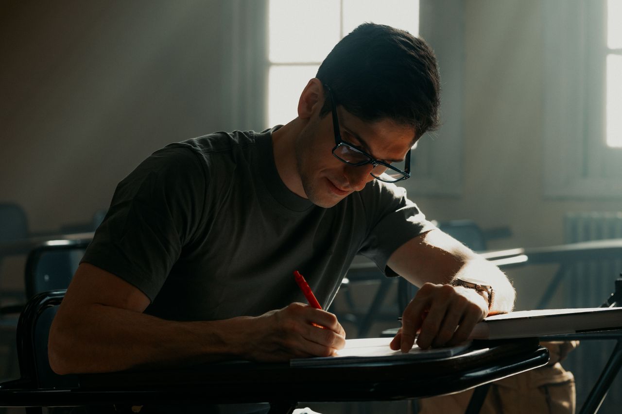university student concentrating on notes in a sunlit buenos aires cla