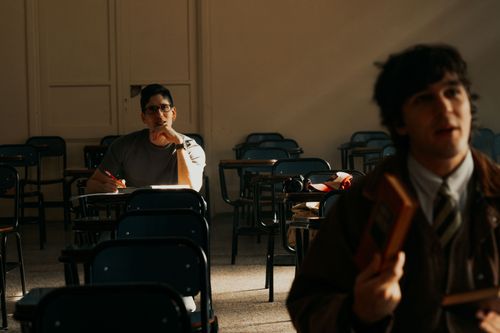 Free Two students in an Argentine university classroom studying during daylight. Stock Photo