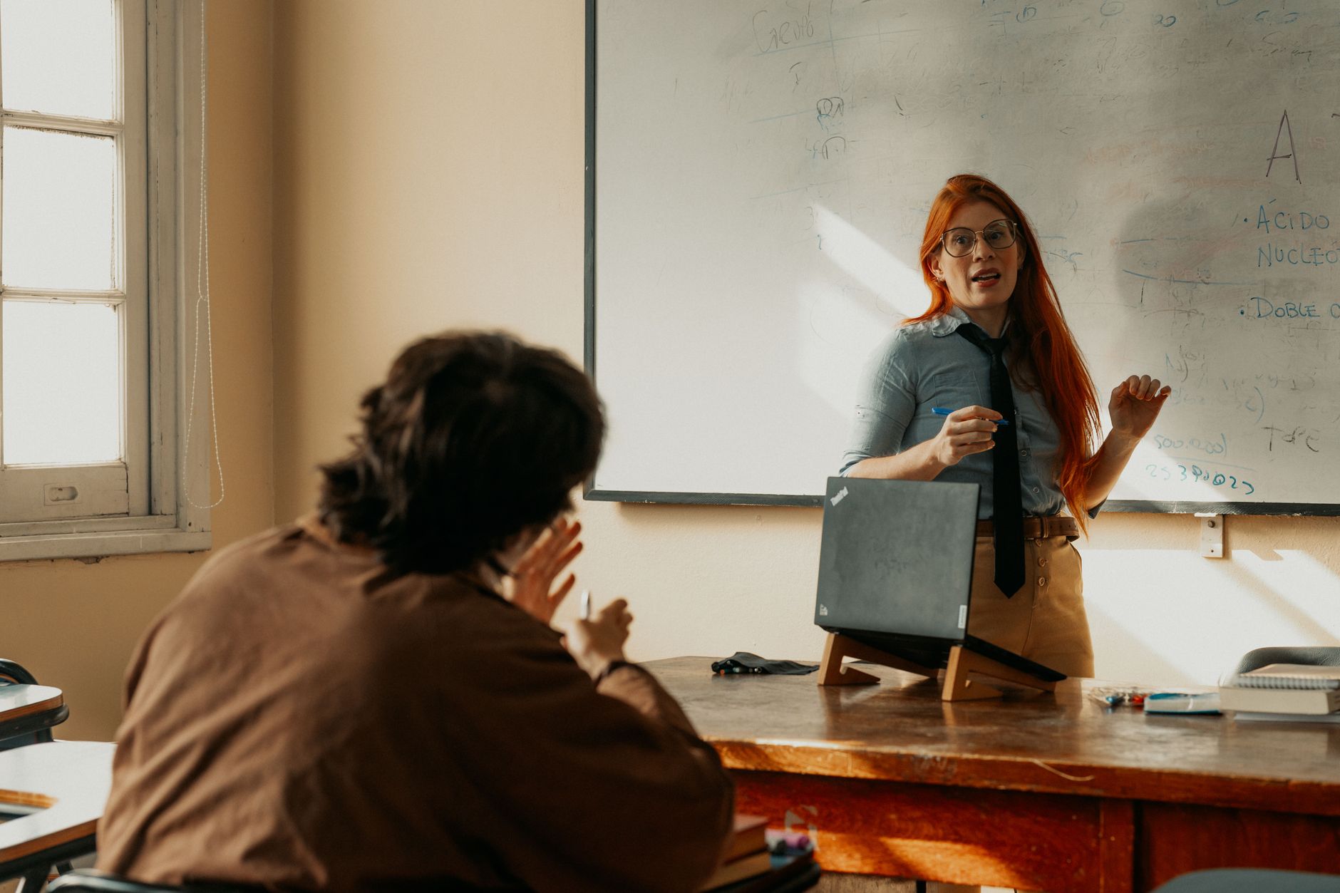 Student consulting with a professor about university applications