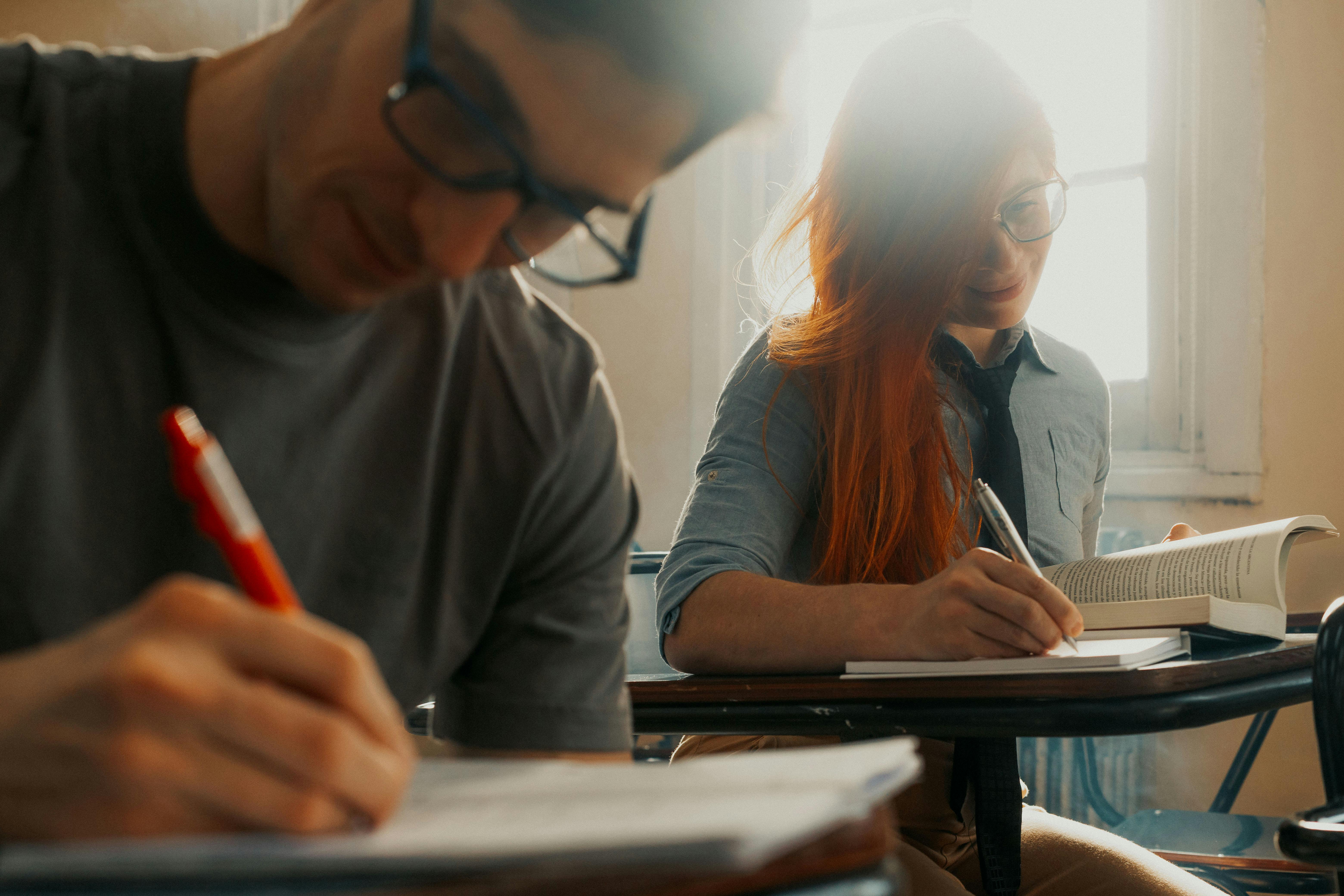 Focused students studying in a classroom, Buenos Aires setting.