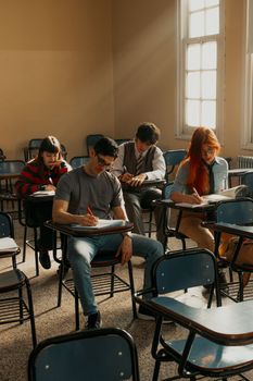 Students in a classroom setting, focused on their tests in Buenos Aires, Argentina.