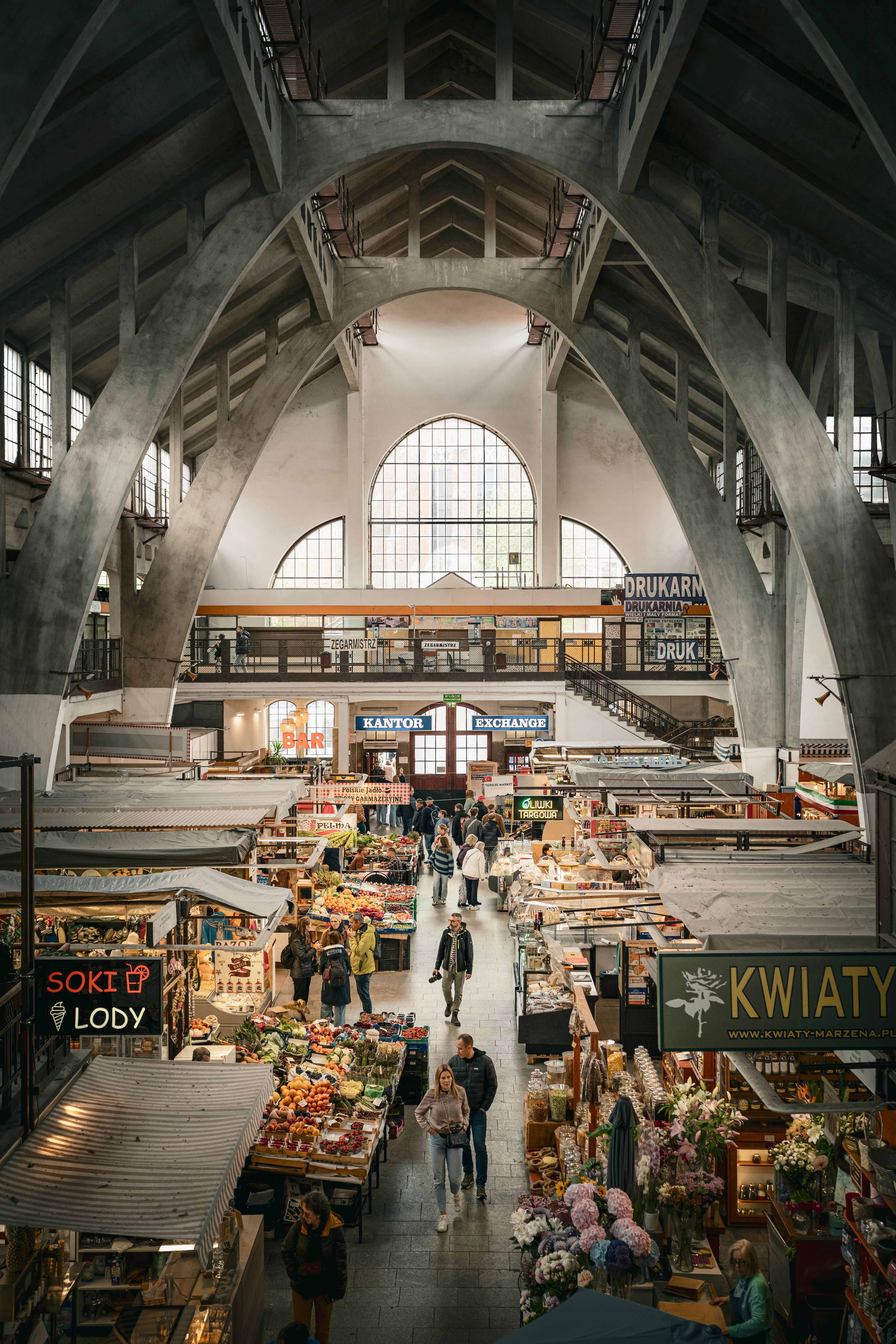 Colourful food stalls at Kraków's covered market hall