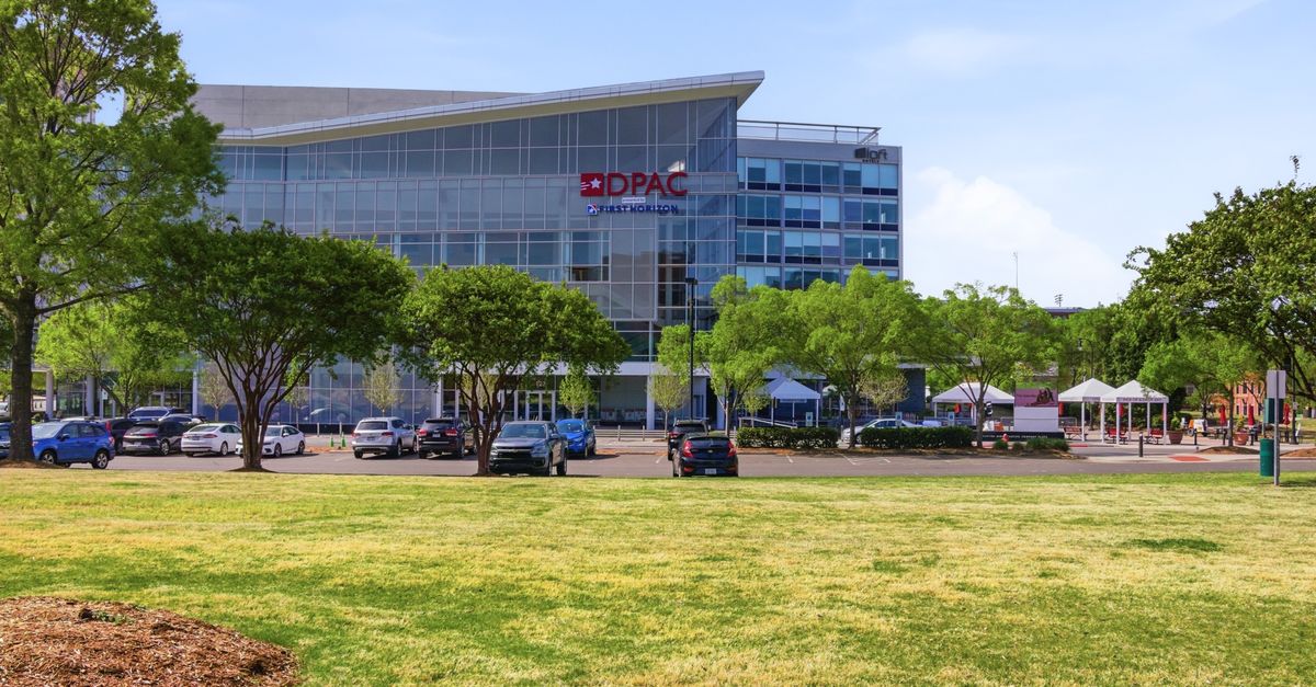 Corporate office complex development with modern skyline and construction