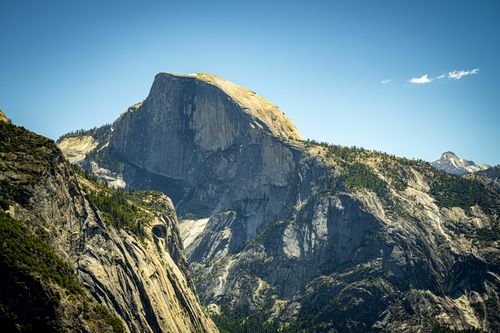 Free Captivating landscape of Half Dome in Yosemite National Park, under a clear blue sky. Stock Photo