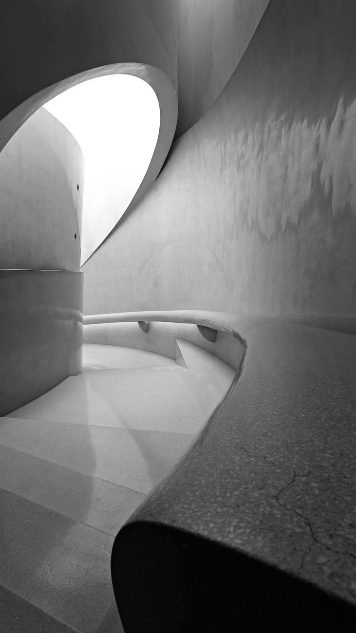 Helical Stair & Raw Plaster House