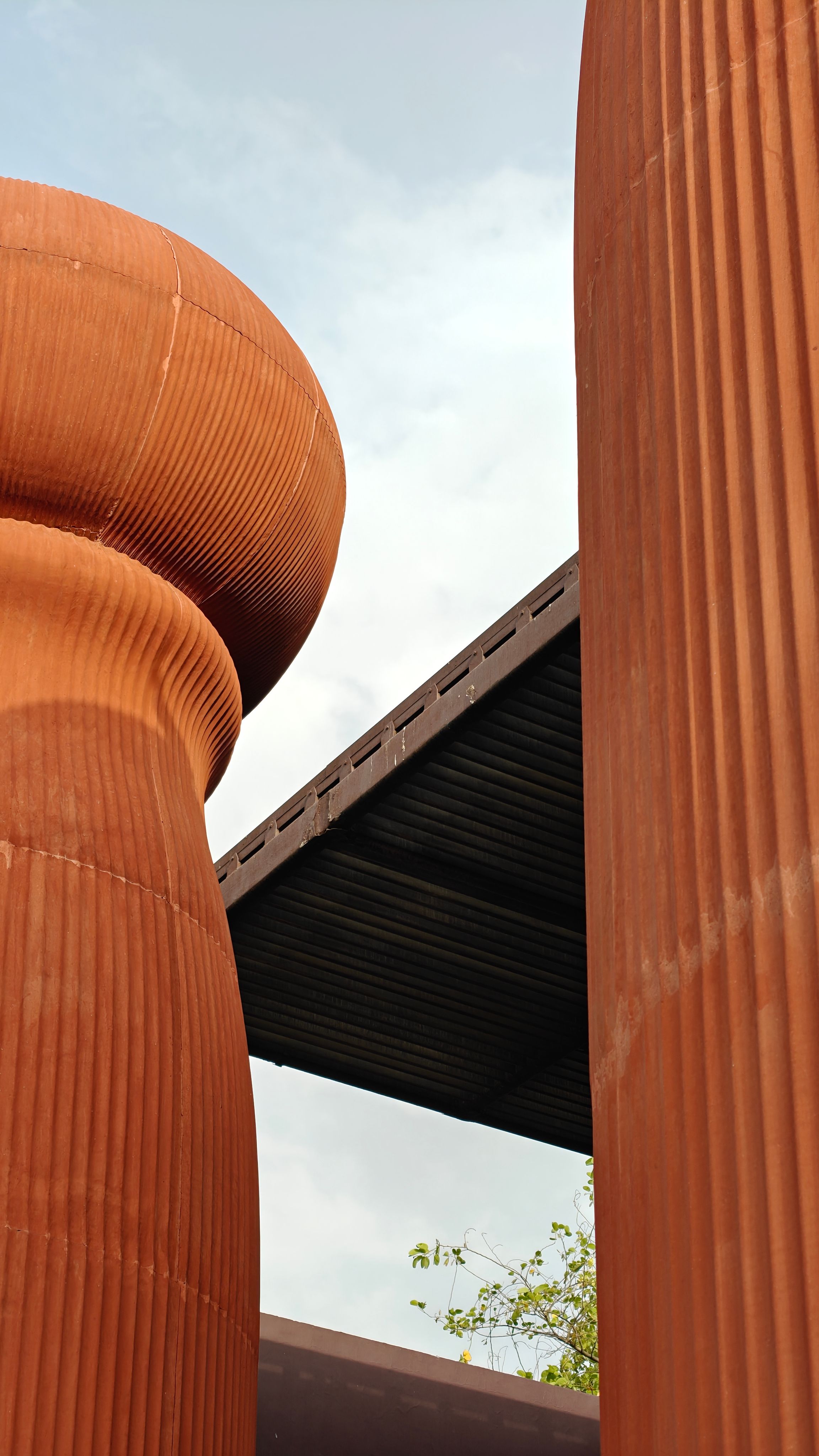 Abstract Architecture with Red Brick Columns · Free Stock Photo