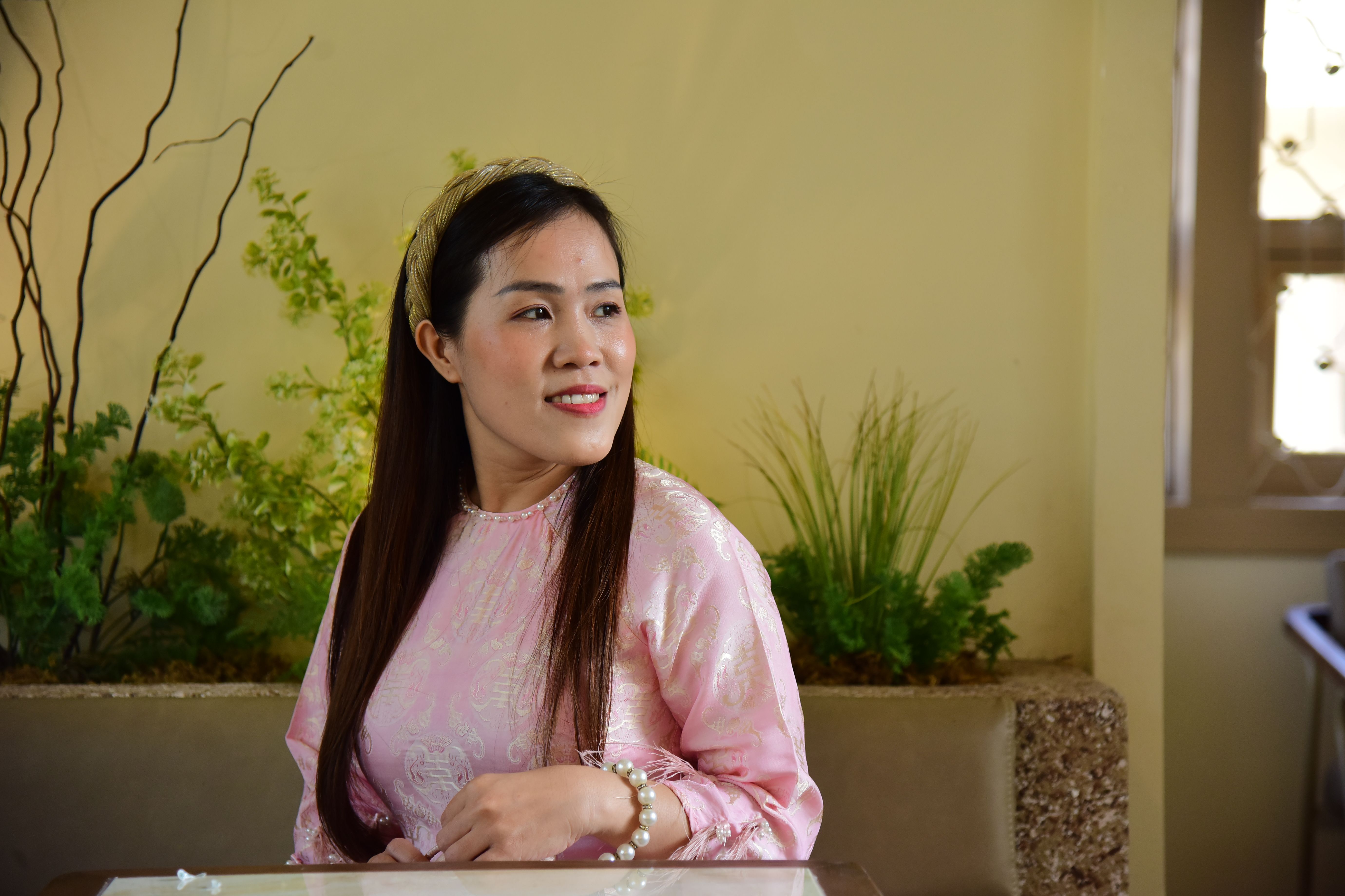 Portrait of Woman in Pink Traditional Dress Indoors · Free Stock Photo