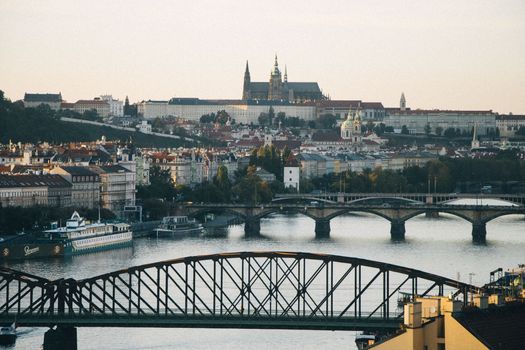 Charles Bridge at sunrise with a photographer — Prague