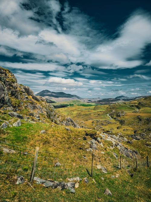 Free Stunning view of the rolling hills and rugged terrain in the Irish countryside. Stock Photo
