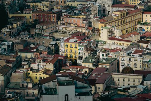 Free Aerial view of Naples' vibrant architectural landscape, showcasing historic Mediterranean buildings. Stock Photo
