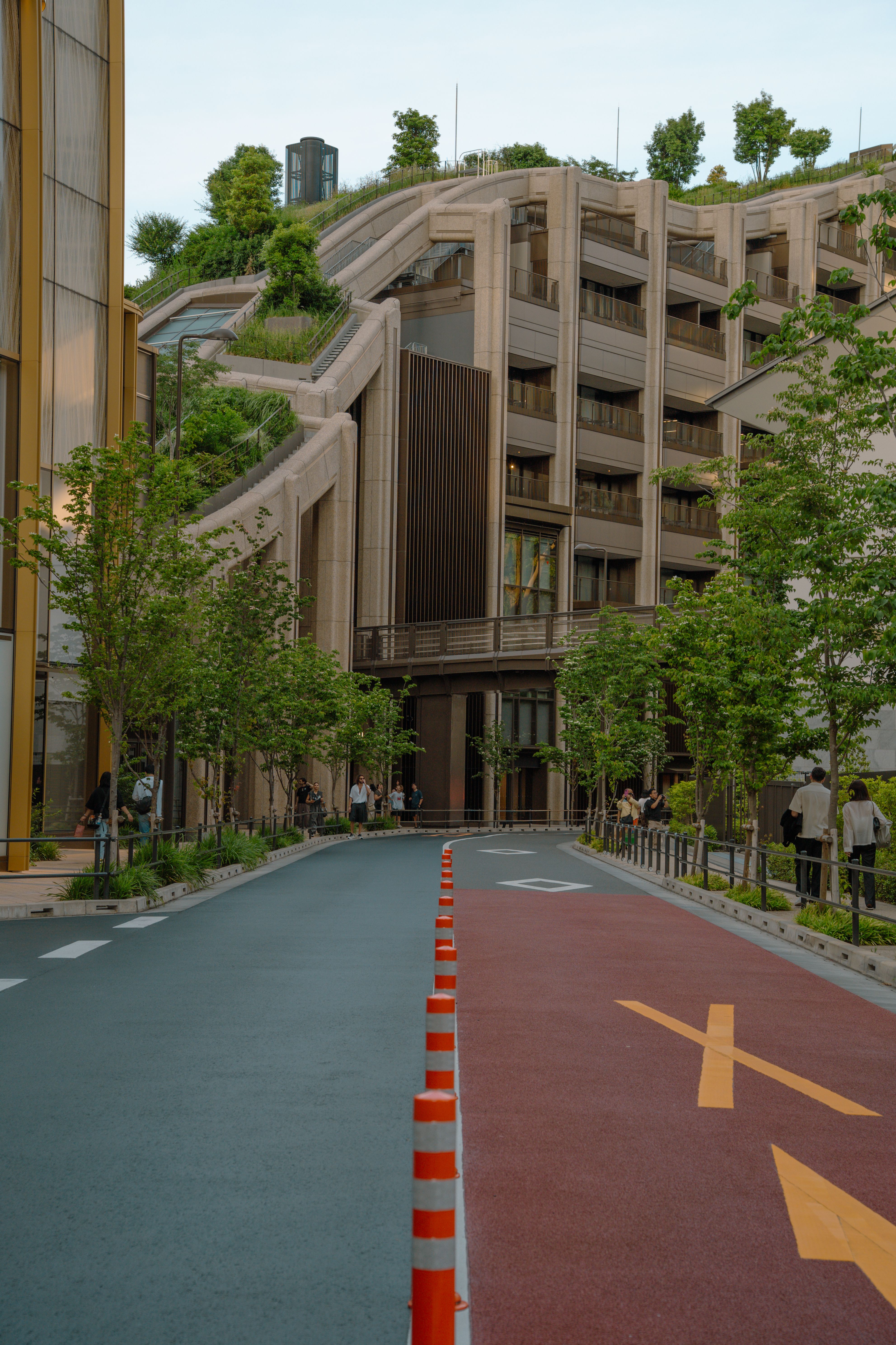 Explore the unique urban design featuring greenery and modern architecture in Tokyo, Japan.