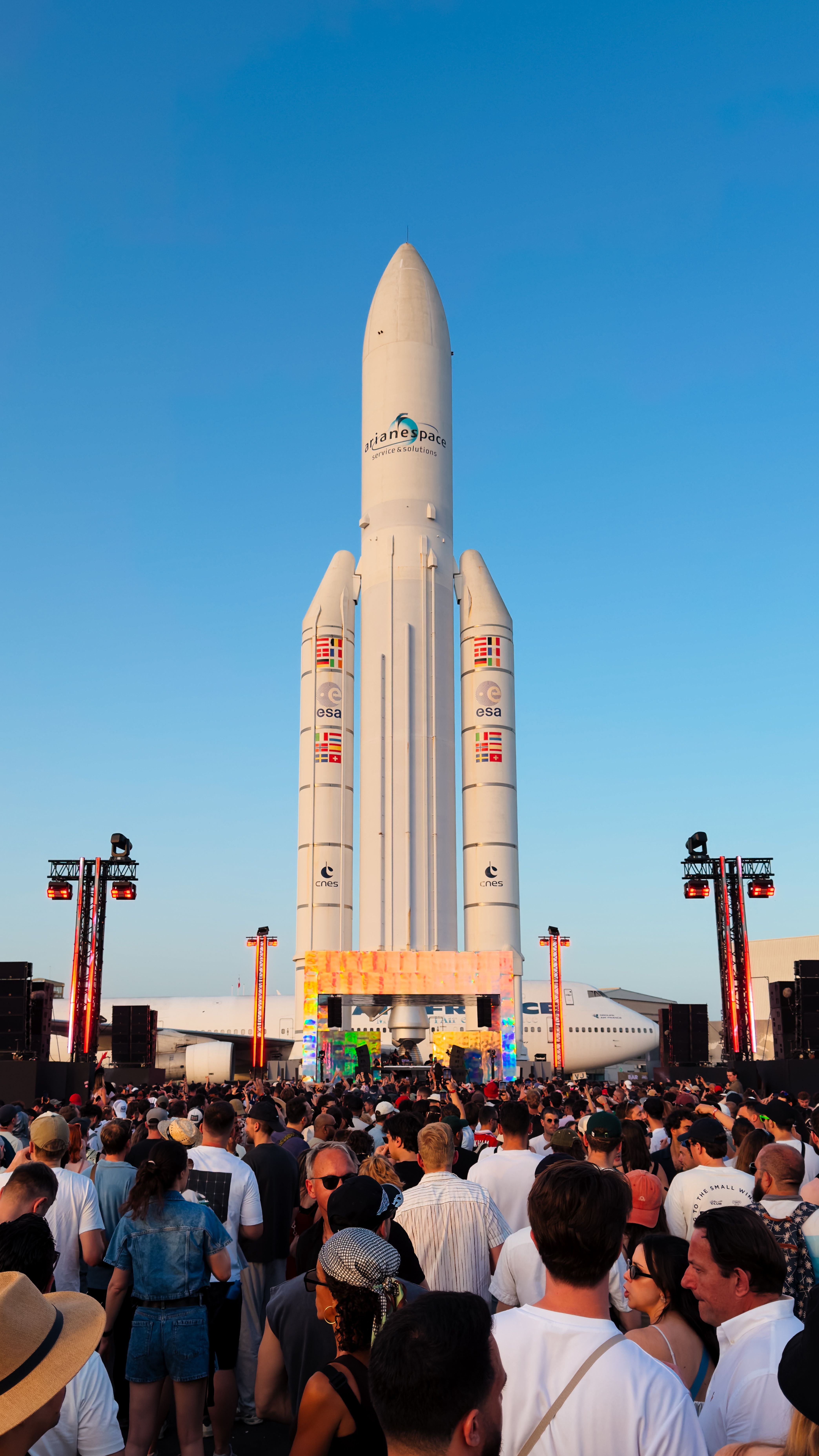 Crowd Gathers at Rocket Launch Event in Paris · Free Stock Photo