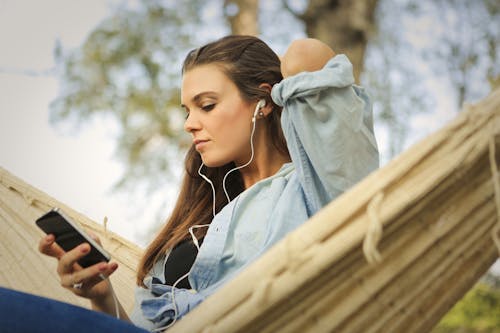 Free Woman Listening to Music Stock Photo