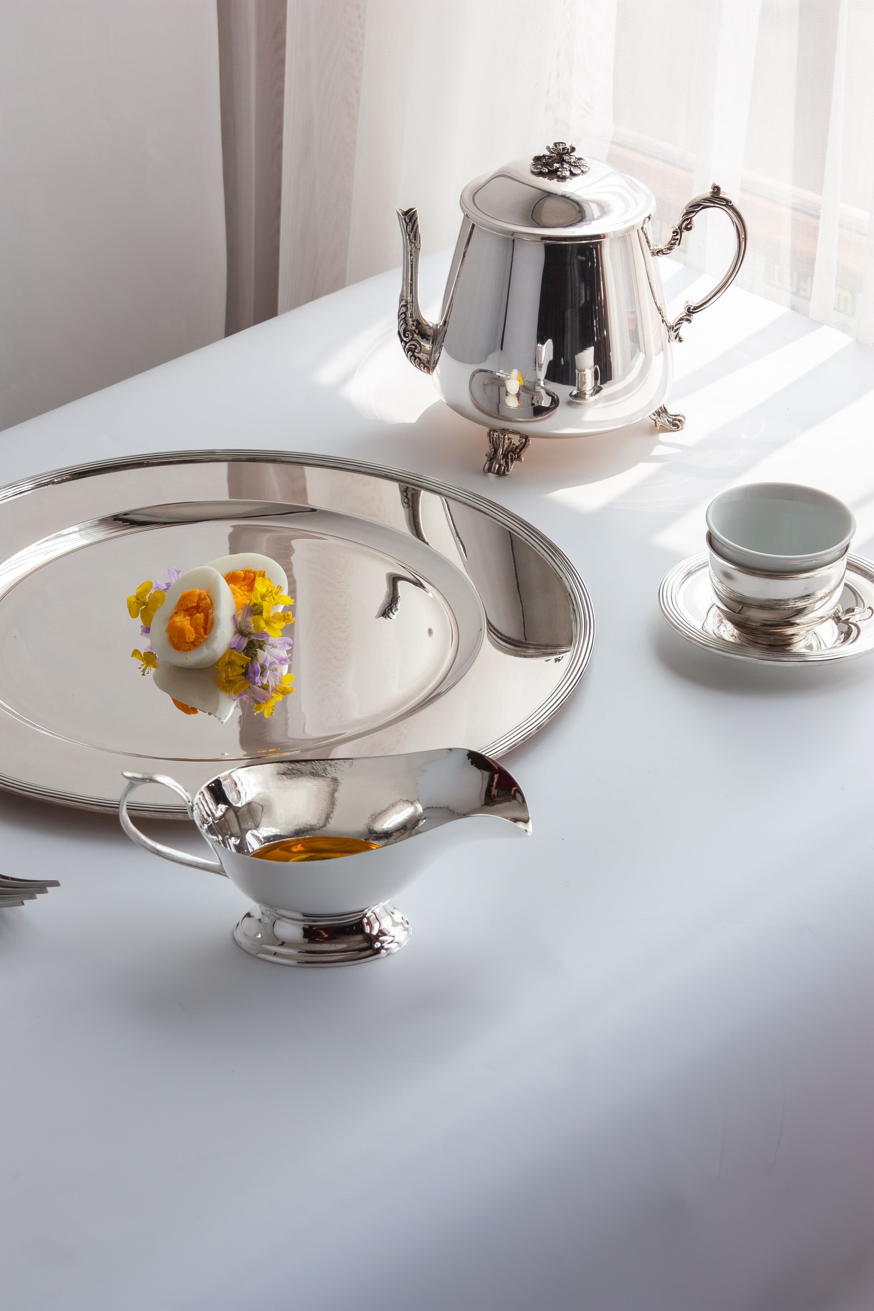 Elegant Silver Tea Set on White Tablecloth · Free Stock Photo