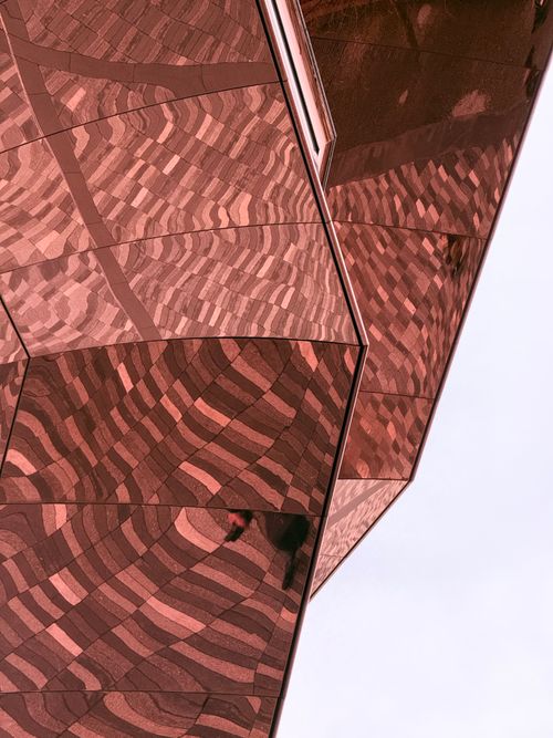 Free Abstract view of modern geometric architecture with a reflective surface in New York City. Stock Photo