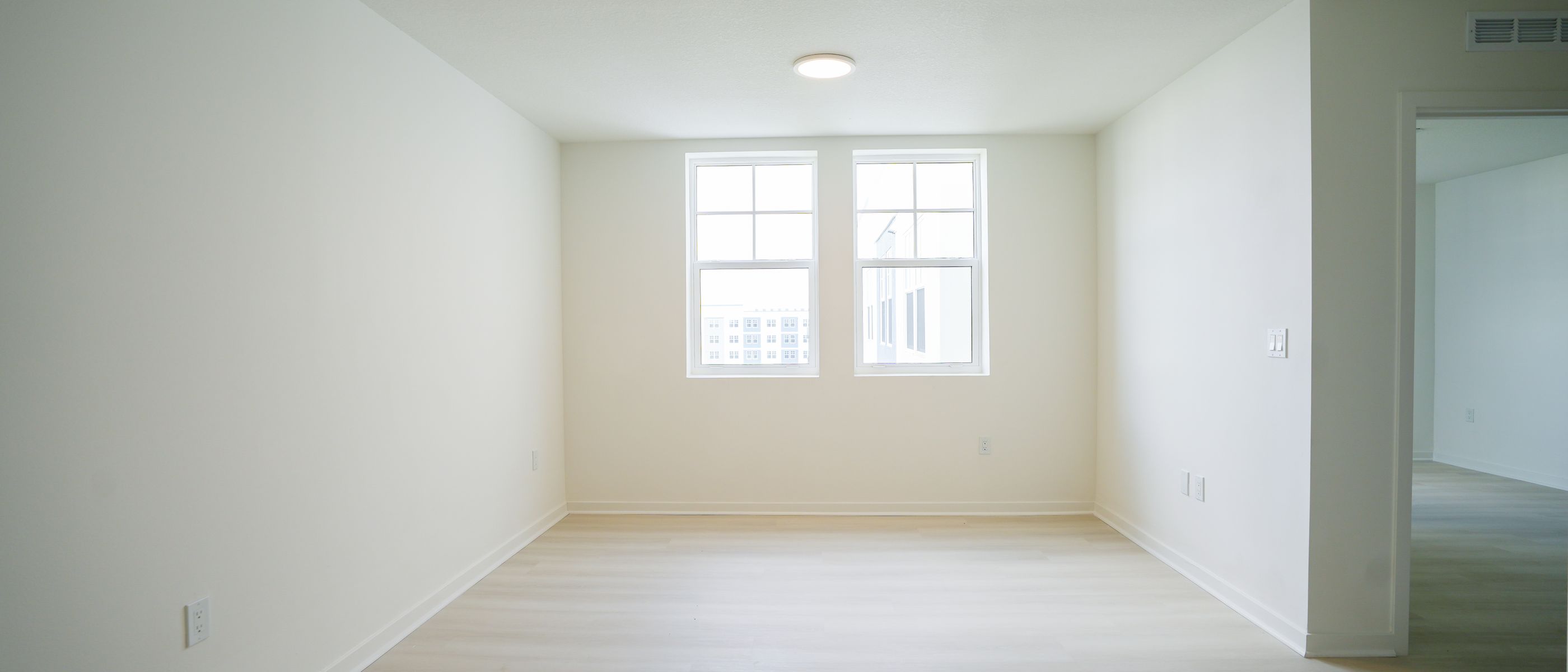 Masonry and Render Painting in Mayfair — careful masking before painting begins