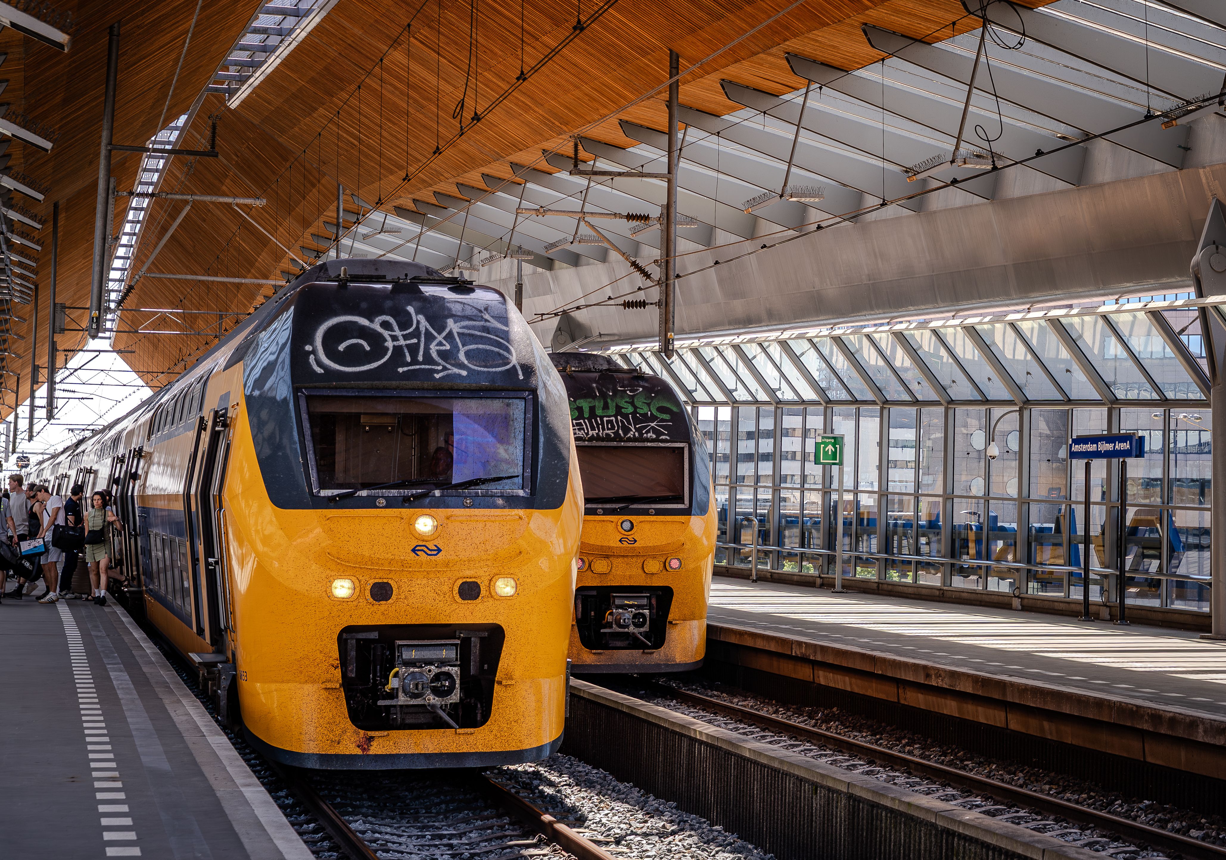 Dutch Trains at Amsterdam Station Platform · Free Stock Photo
