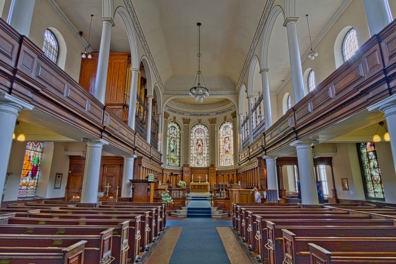 Beautiful interior view of the historic St Ann's Church in Manchester, showcasing its ornate architecture.