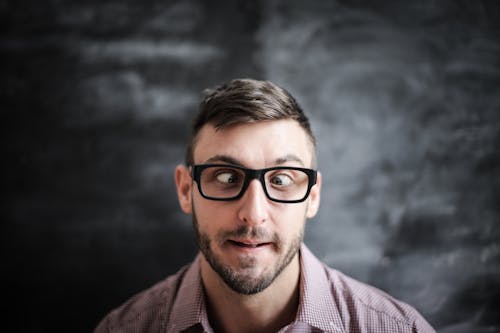 Man Wearing Black Framed Eyeglasses