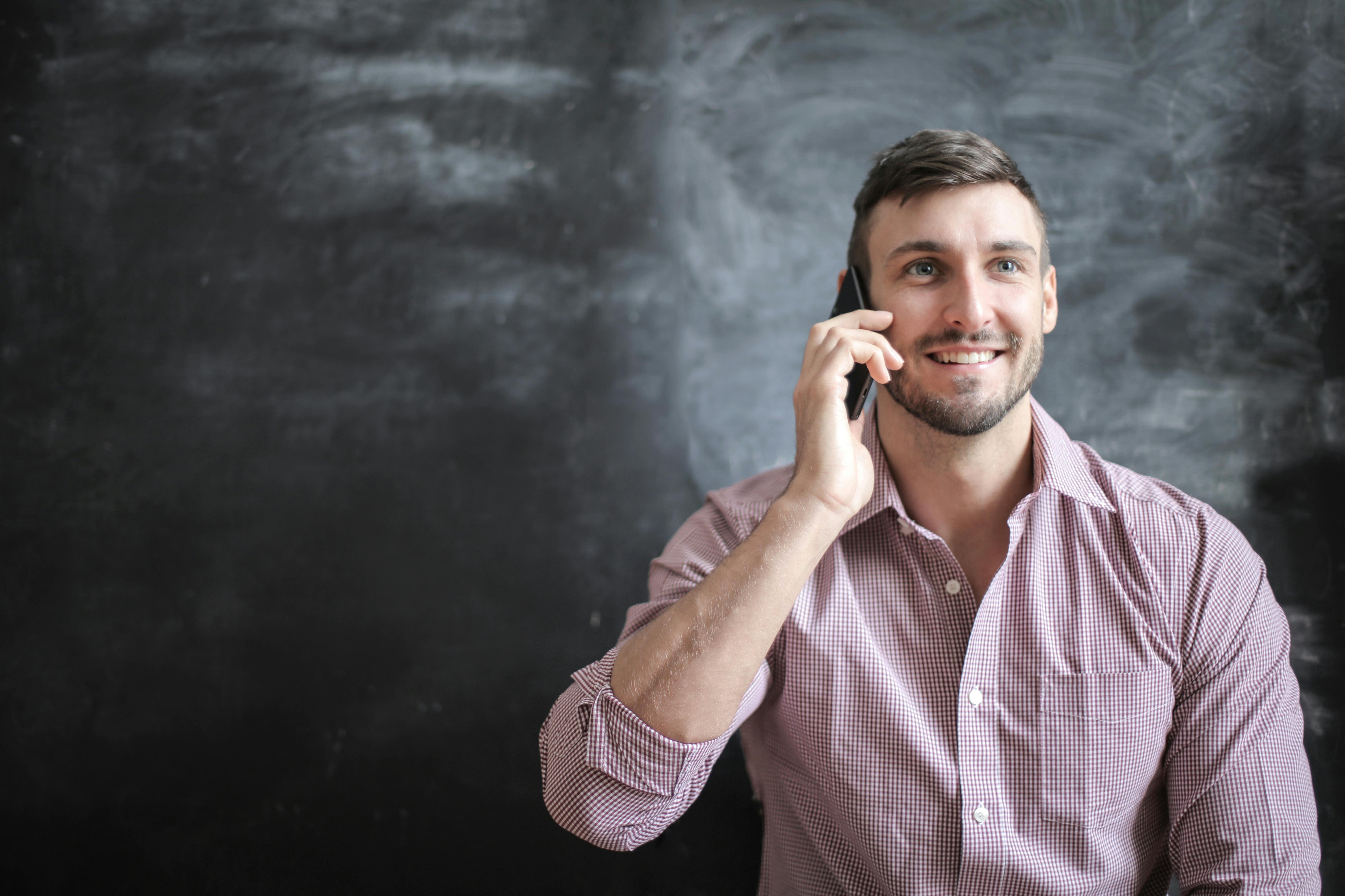 Man using mobile phone. | Photo: Pexels