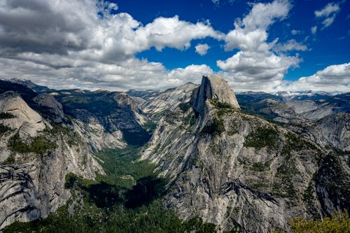 Free A breathtaking aerial view of Half Dome in Yosemite National Park, showcasing the rugged beauty of California's Sierra Nevada. Stock Photo