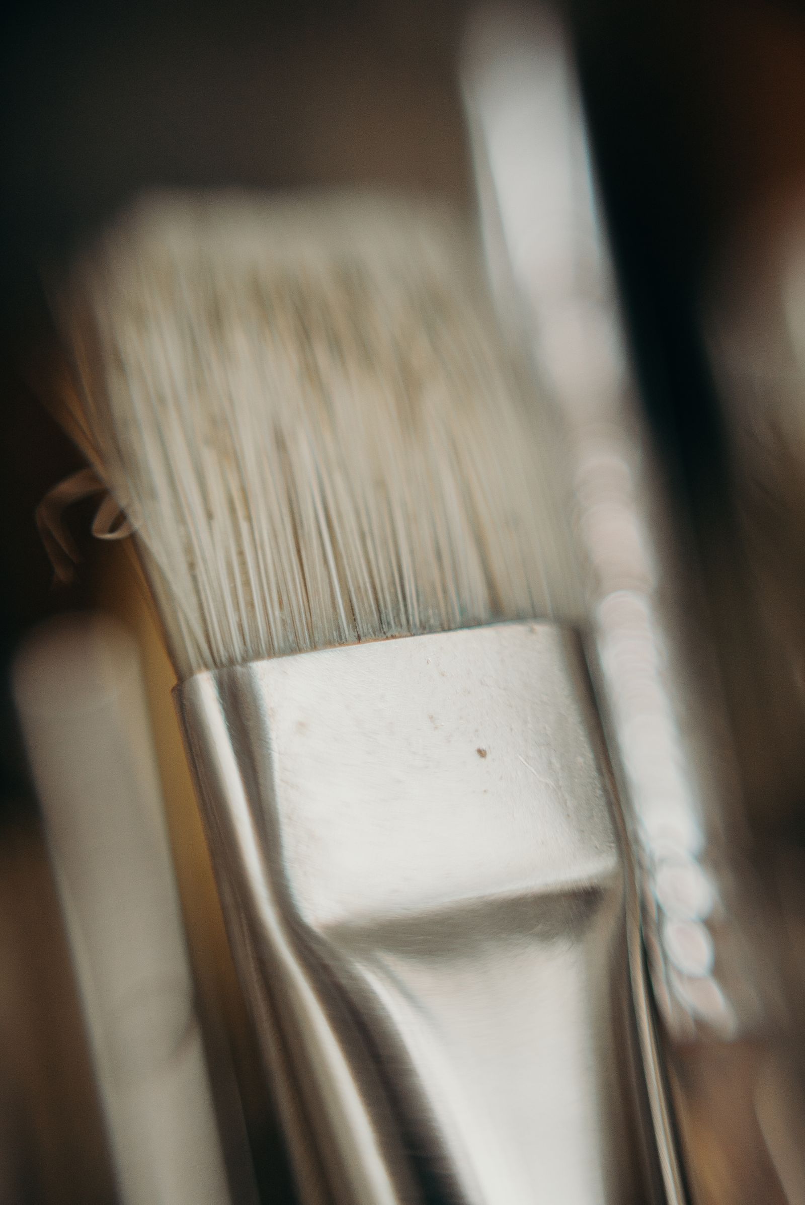 Close up macro shot of paint brush bristles showing fine tapered filament tips