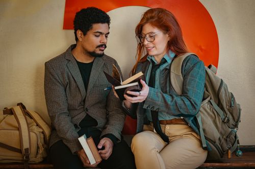 Free Young adults in a study session at a university in Buenos Aires, Argentina, sharing ideas and engaging in conversation. Stock Photo