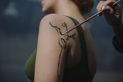 Woman Having a Henna Tattoo
