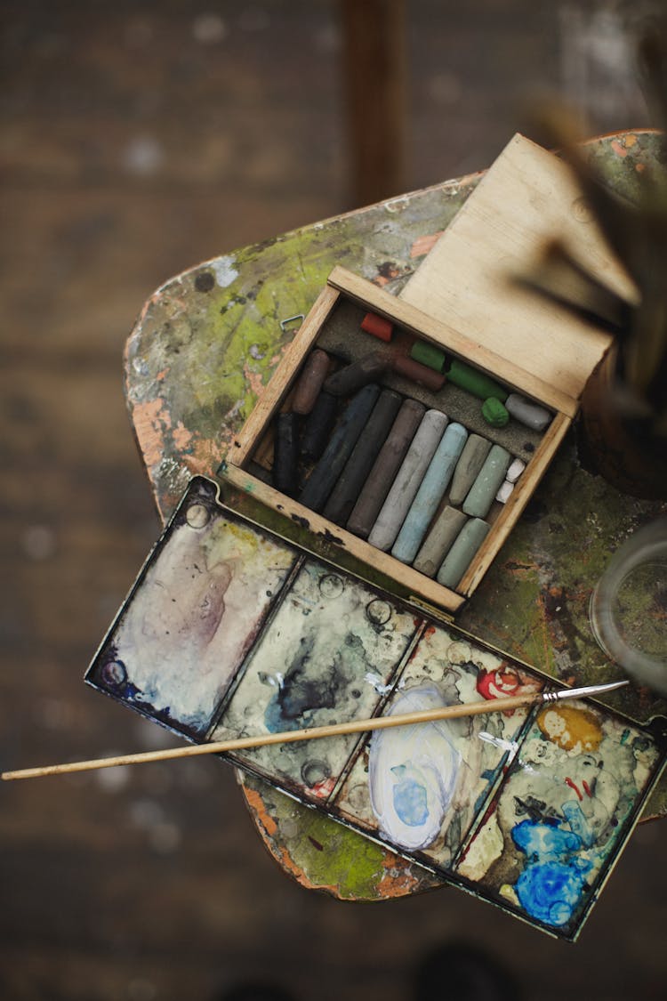 Brown Wooden Box Beside Water Color