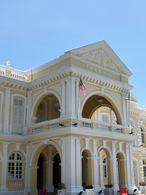 Free Captured view of Penang Town Hall showcasing colonial architecture under a clear blue sky. Stock Photo