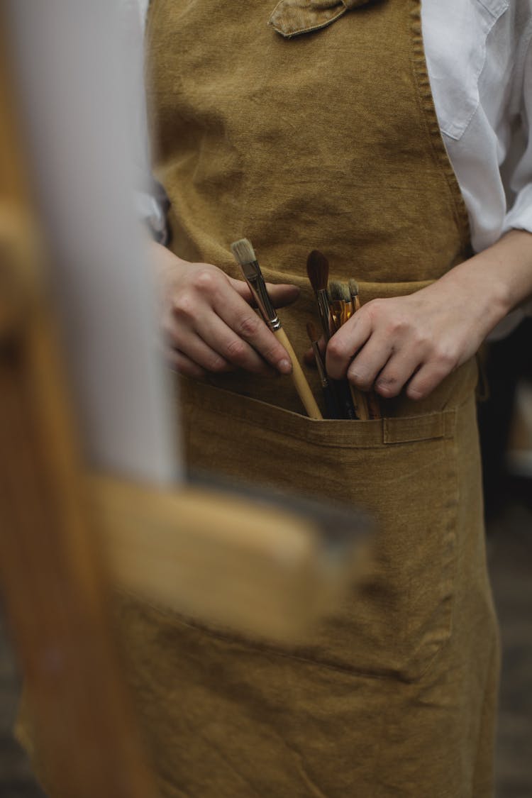 A Photo Of Paint Brushes On Brown Pocket