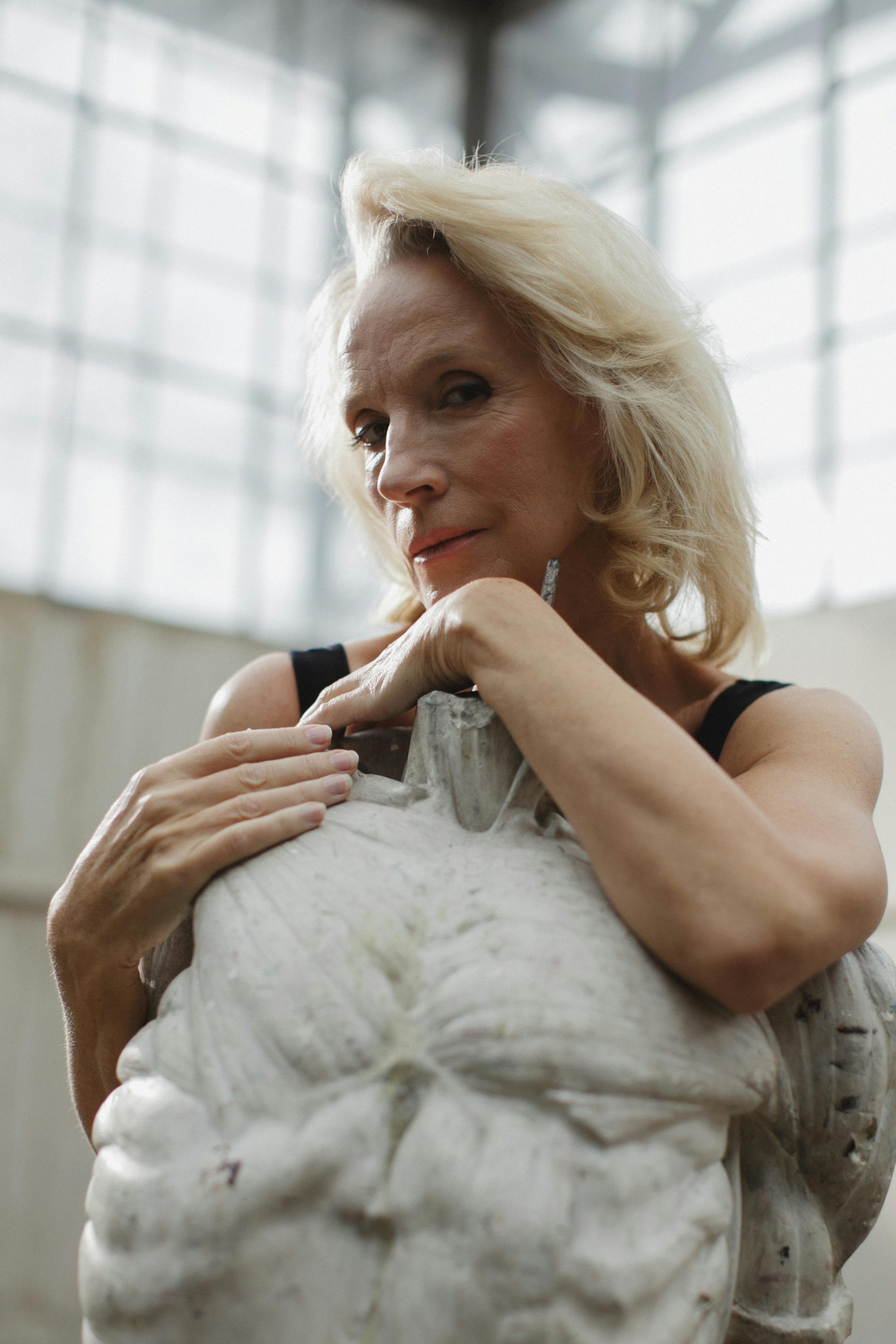 elderly woman in black tank top