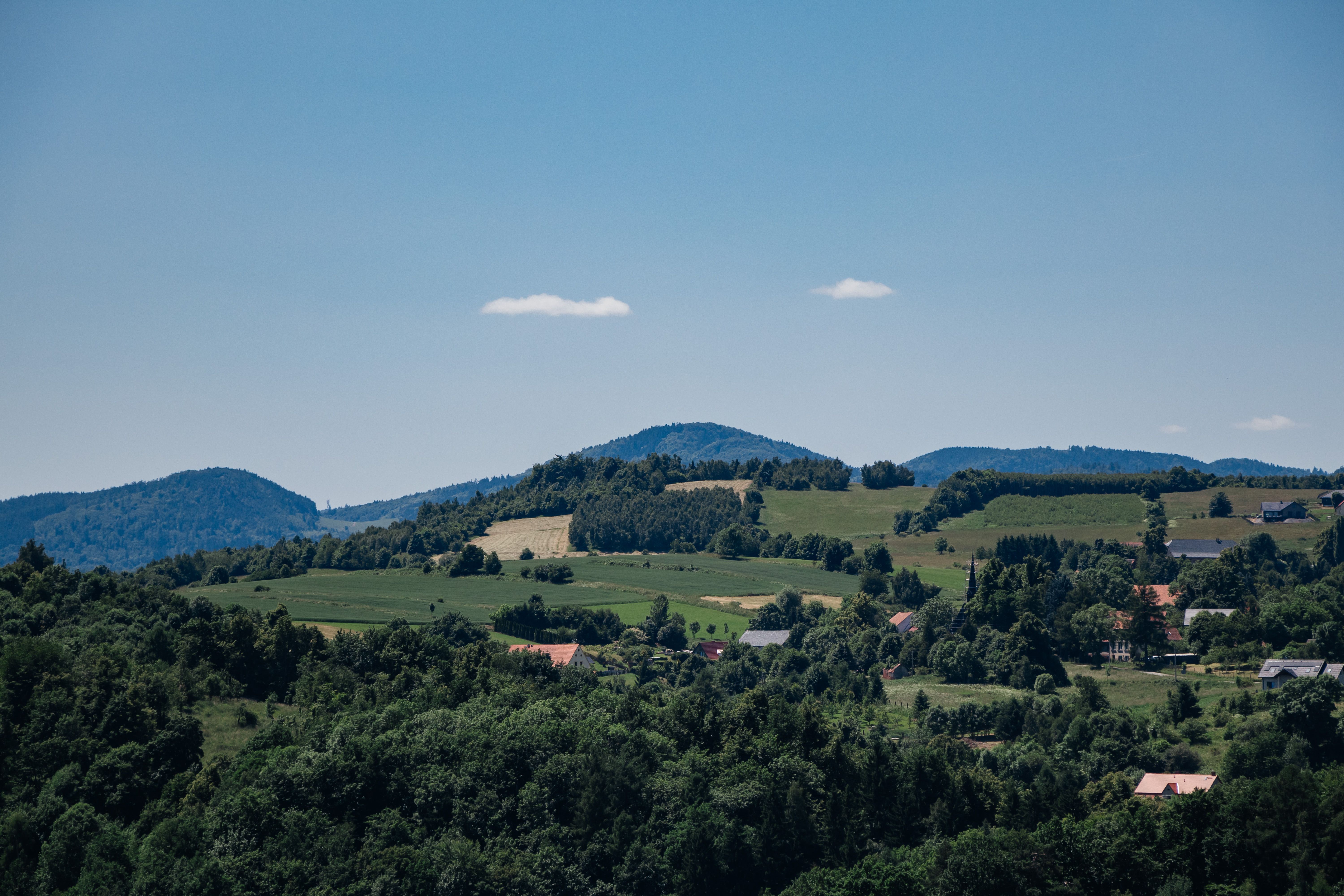 Picturesque landscape of green hills and village in Zagórze Śląskie, Poland.