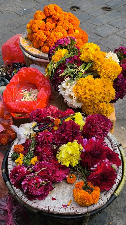 Free Colorful assortment of flowers at a local market in Kathmandu, Nepal. Stock Photo