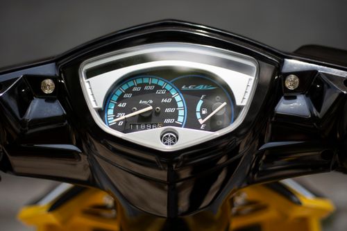 Free Detailed view of a motorcycle speedometer and fuel gauge with clear readings, showcasing vehicle design. Stock Photo