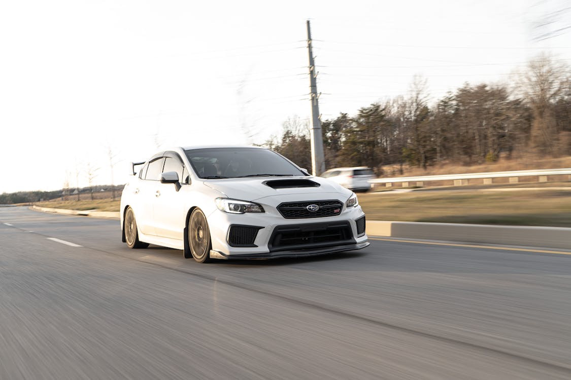 Free White Subaru Impreza on Road Stock Photo