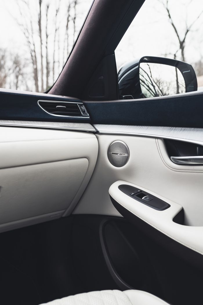 Car seat gap filler and storage pocket