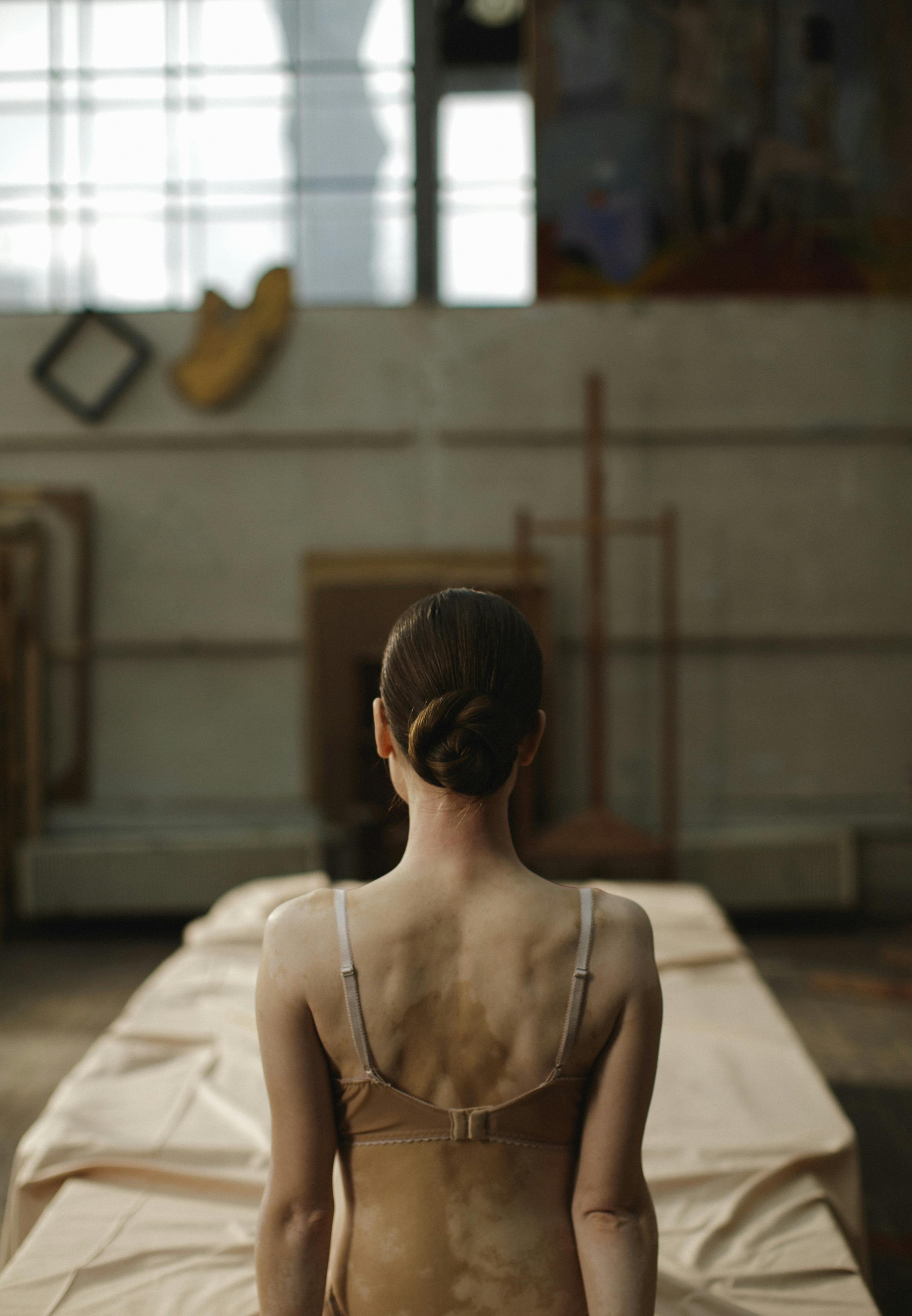 woman wearing brown brassiere