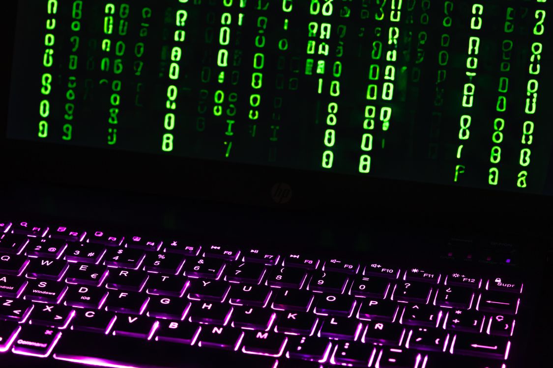 Computer Keyboard Matrix Matrix-inspired code on laptop keyboard · Free Stock Photo
