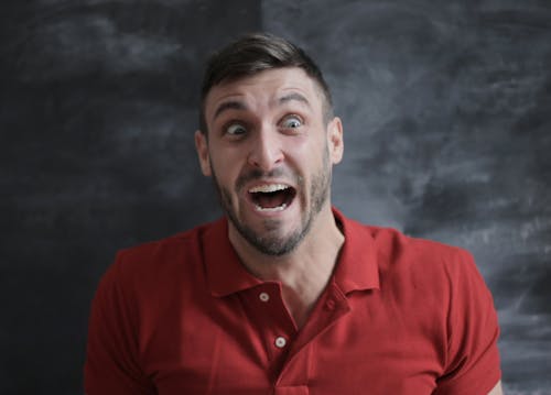 Free Man in Red Polo Shirt Stock Photo