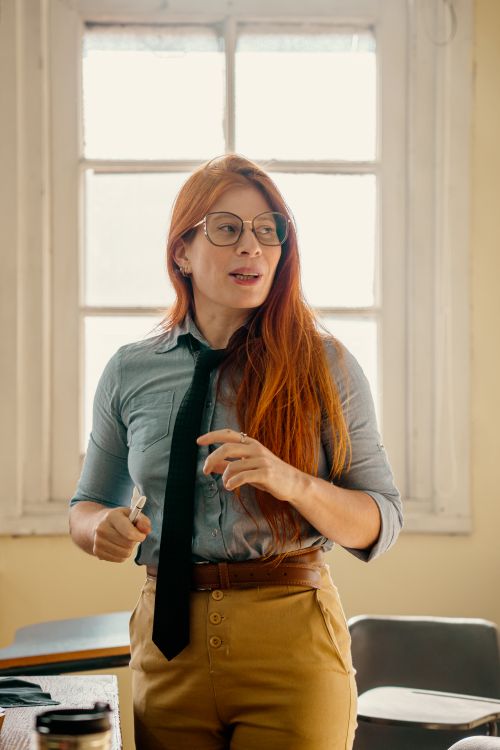 Trainer guiding a student through a beauty lesson
