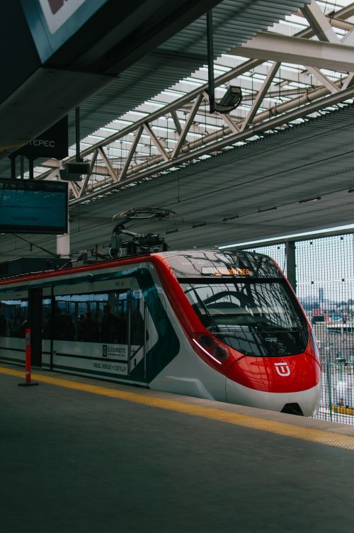 Free A sleek modern train at a Ciudad de México station, showcasing urban transit. Stock Photo