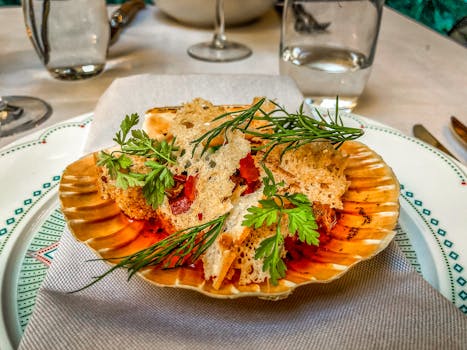 Delicious seafood dish garnished with fresh herbs, served elegantly in Stockholm, Sweden.