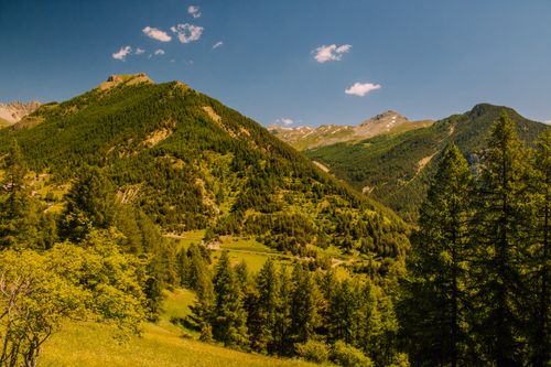 Free Breathtaking view of lush green mountains in Cervières, Provence-Alpes-Côte d'Azur, France. Stock Photo