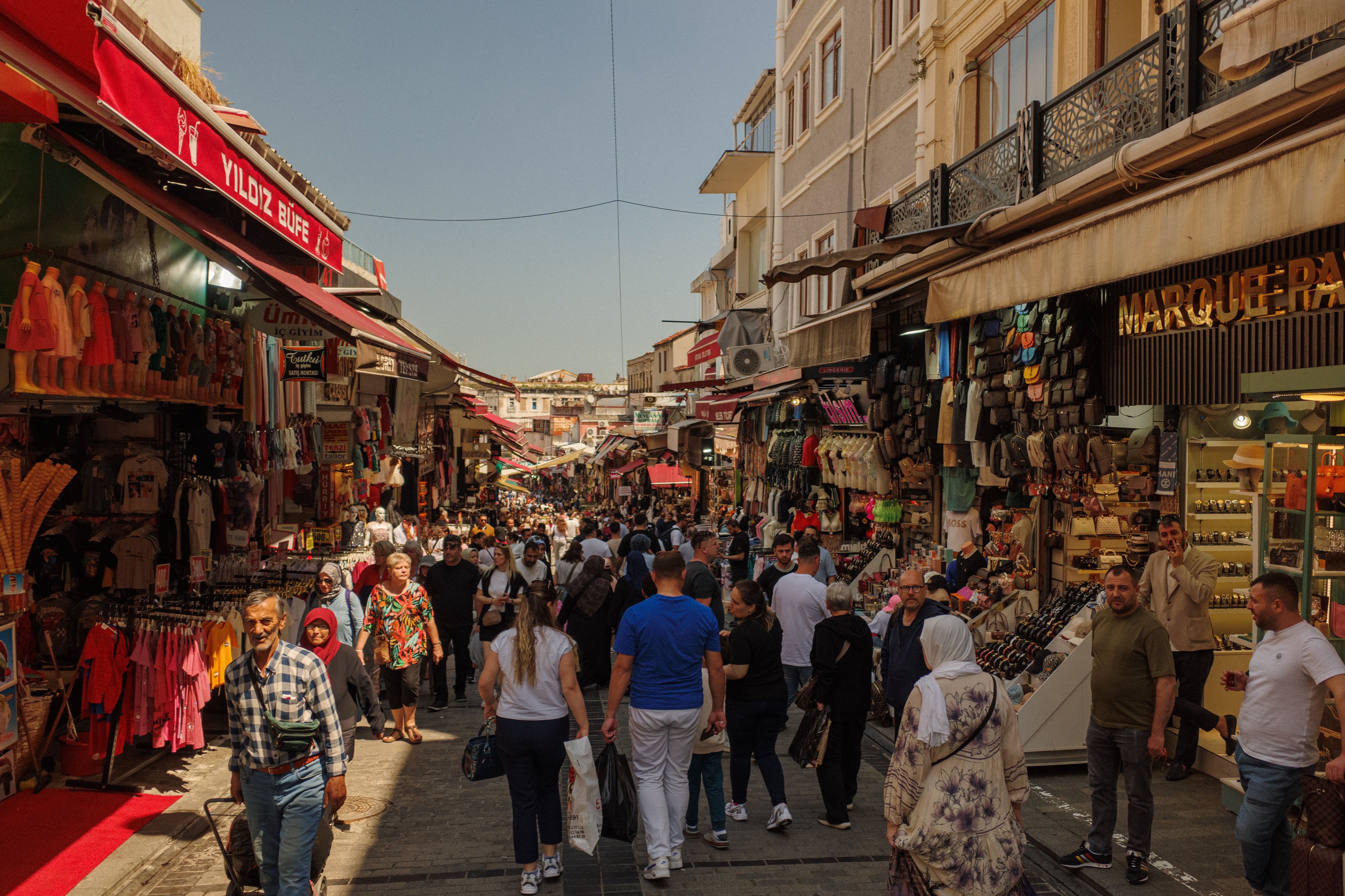 Bustling Old Bazaar in Skopje, North Macedonia, with people shopping.